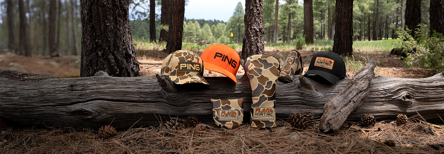 Lifestyle image of flag hunting products in forest on log