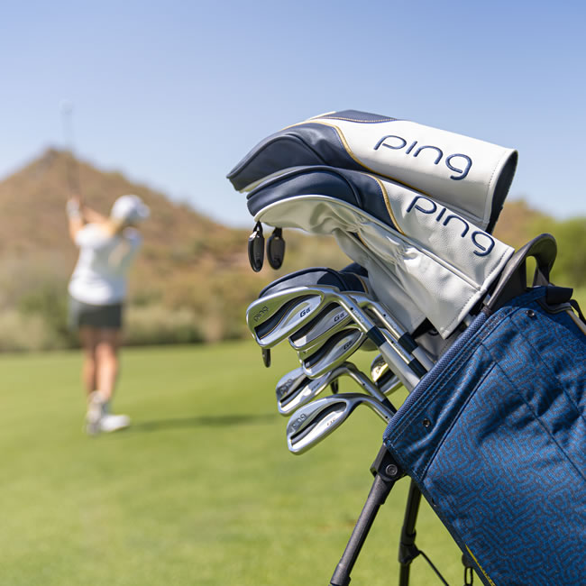 Female golfer playing G Le3 clubs