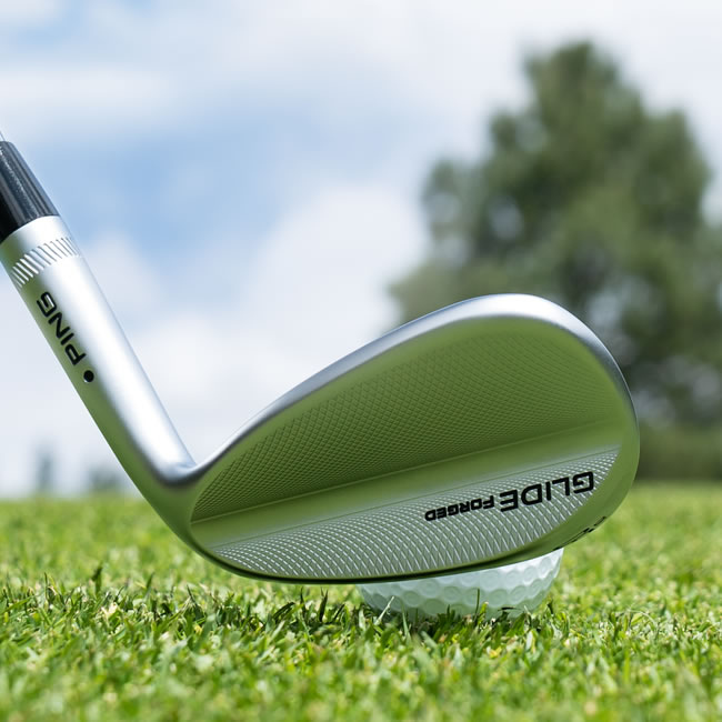 Glide Forged wedge behind ball in grass