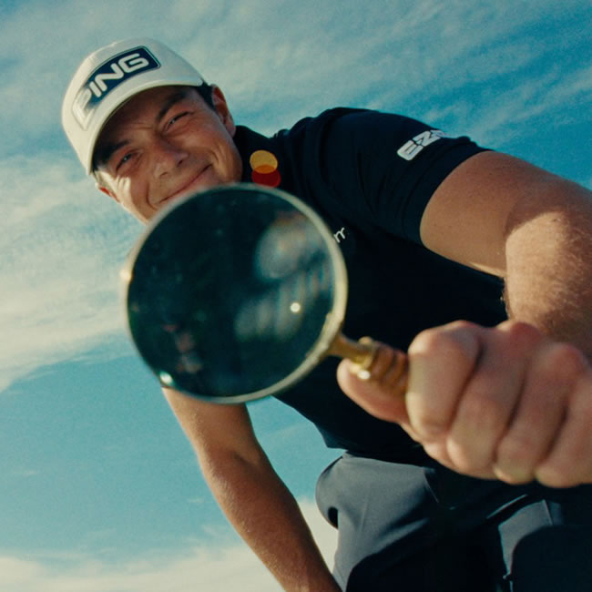Viktor Hovland holding a magnifying glass